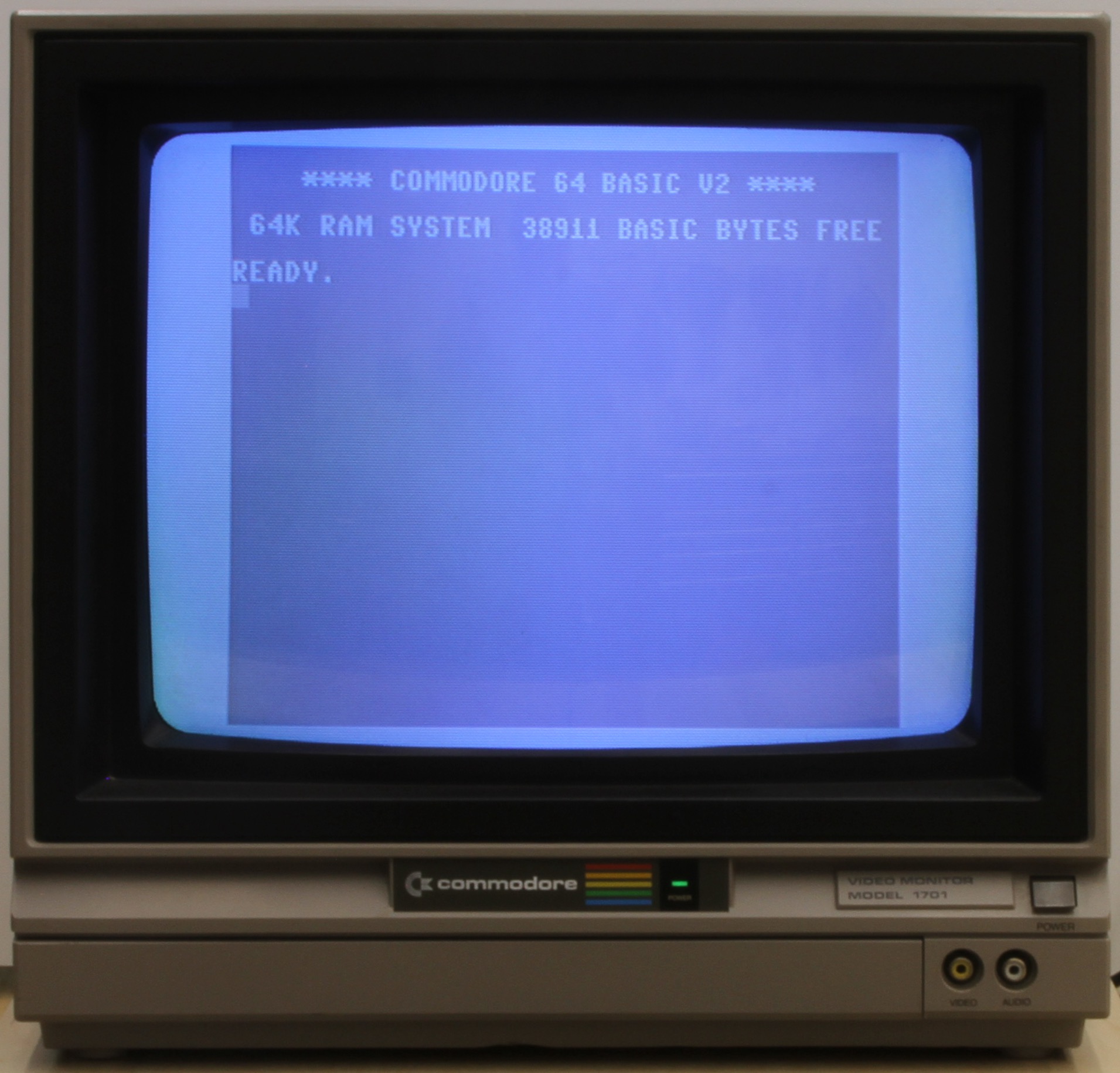 The Commodore 1701 monitor on the bench, displaying a clean image