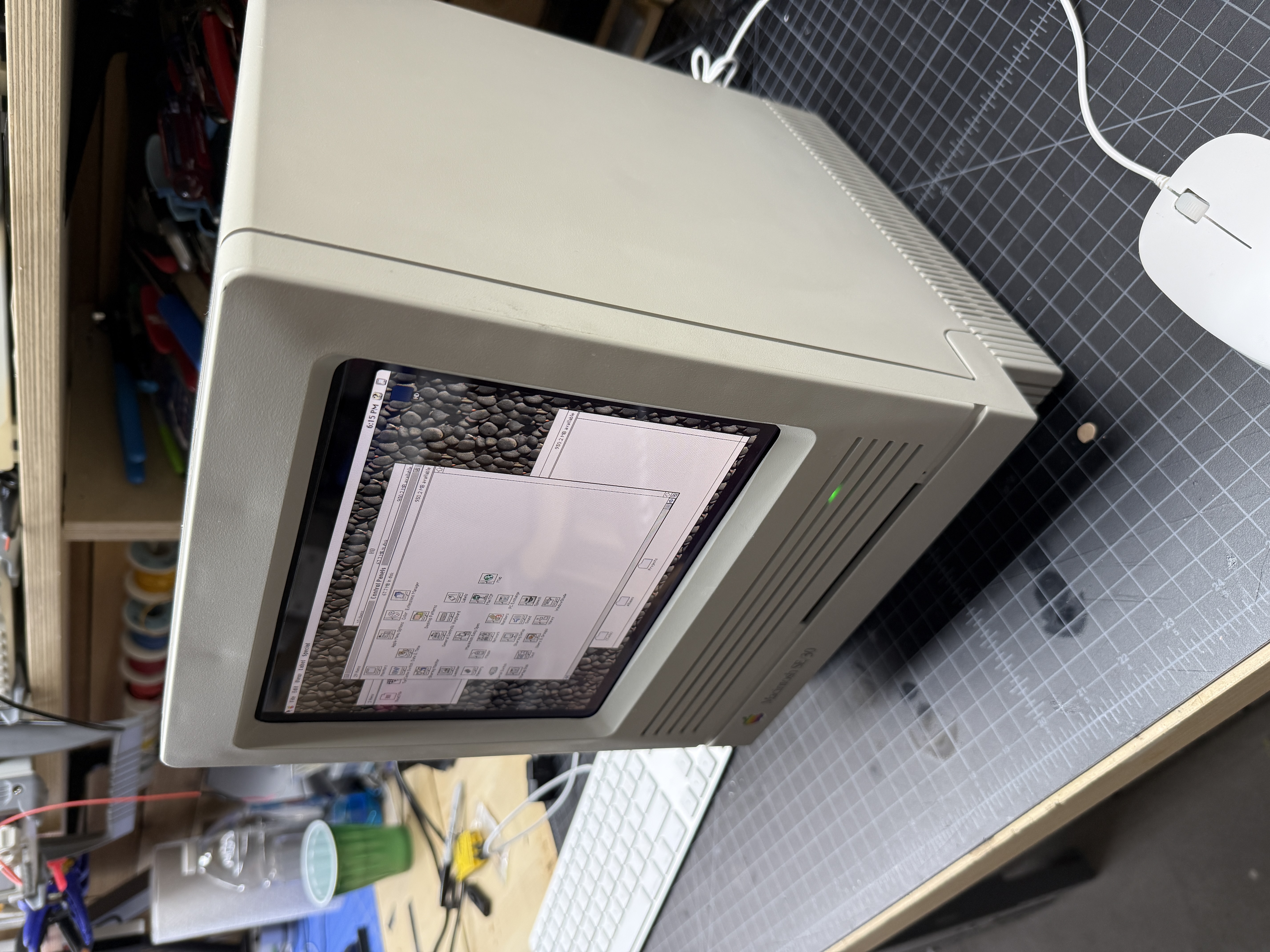 The reimagined SE/30 with the LCD displaying a System 7 desktop