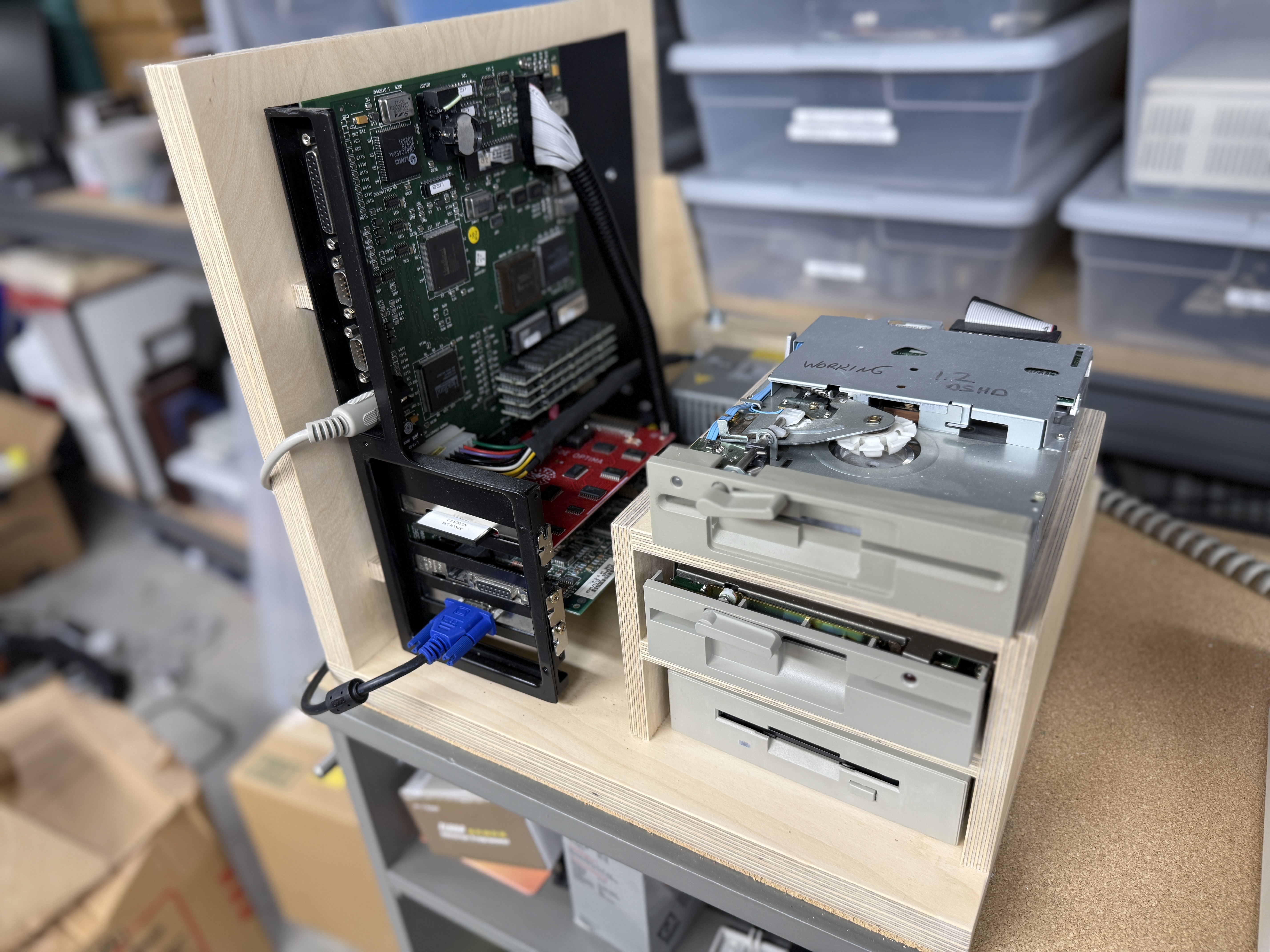 Baltic birch mount holding the motherboard and drive bays