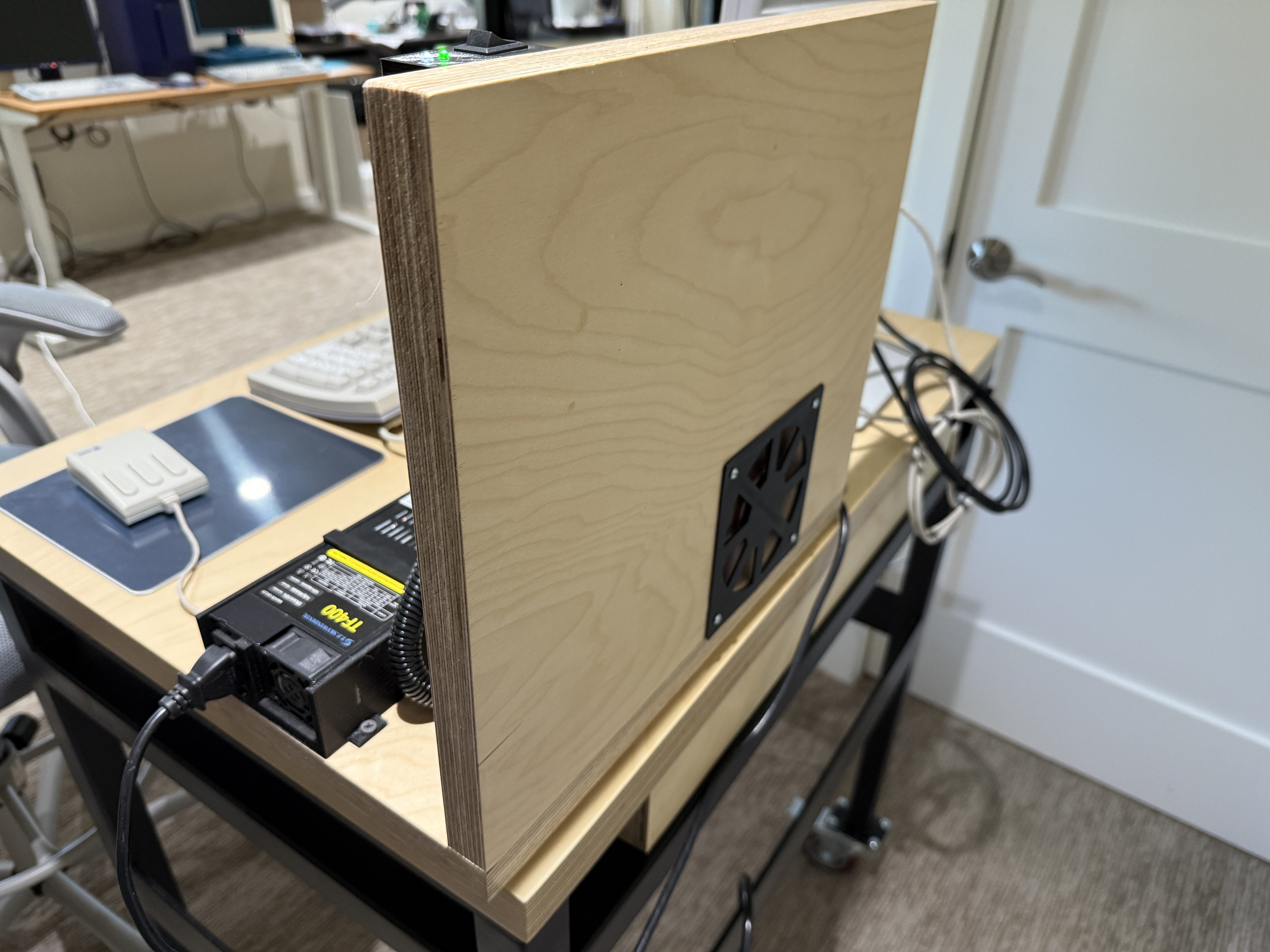 Back of the wood stand showing fan cutout and TF400